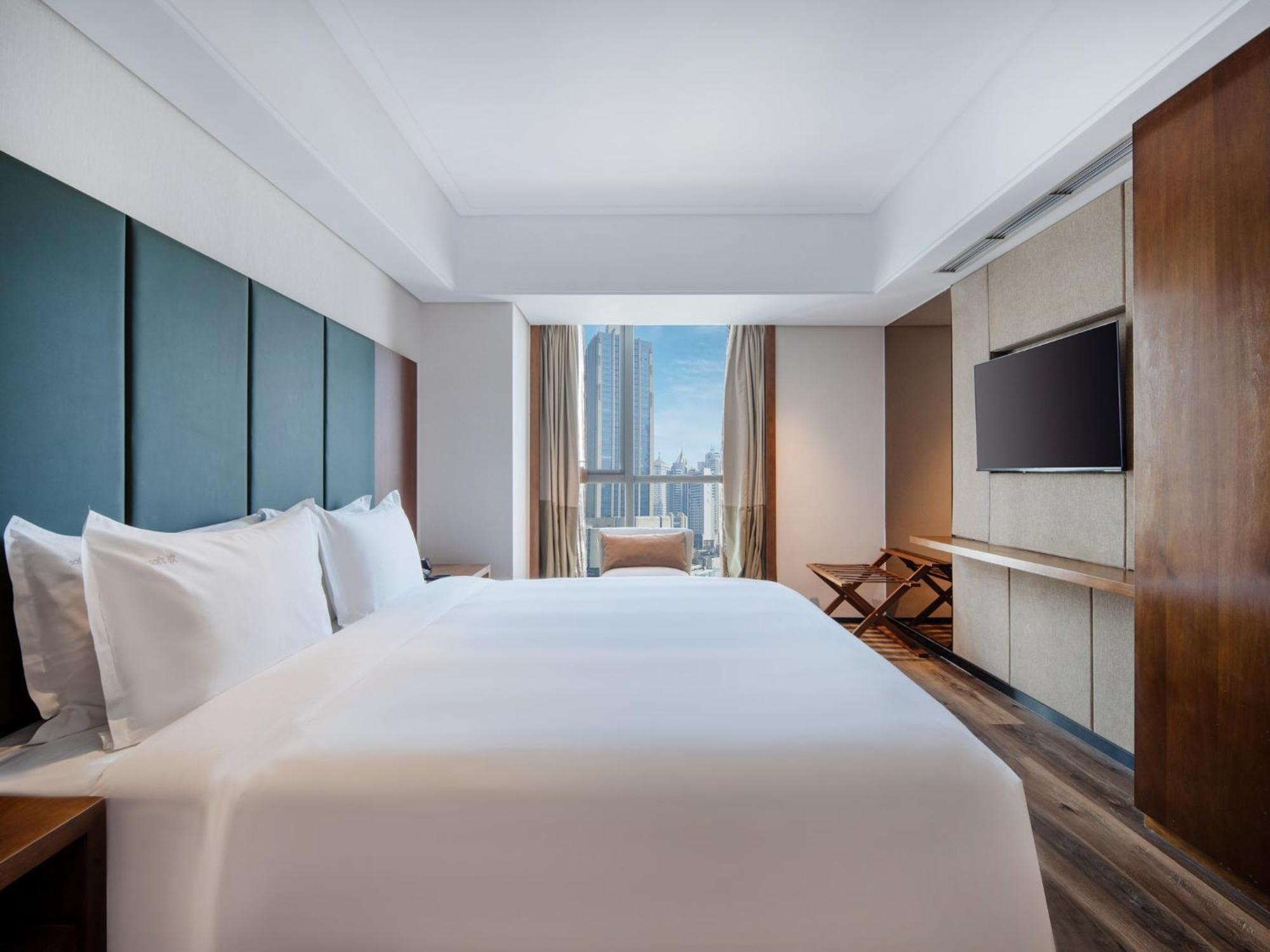Holiday Inn Qingdao City Center By Ihg - May 4Th Square Bagian luar foto